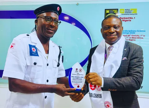 The VC of Covenant Univerisity being inducted as First Aid For All FAFA champion